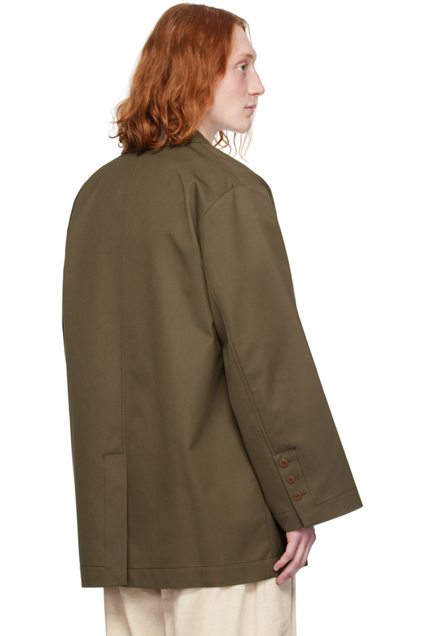 Water-repellent recycled polyester- and cotton-blend gabardine blazer.

· Notched lapel
· Two-button closure
· Welt pocket and flap pockets
· Dropped shoulders
· Three-button surgeon's cuffs
· Central vent at back hem
· Unlined

Supplier color: Khaki