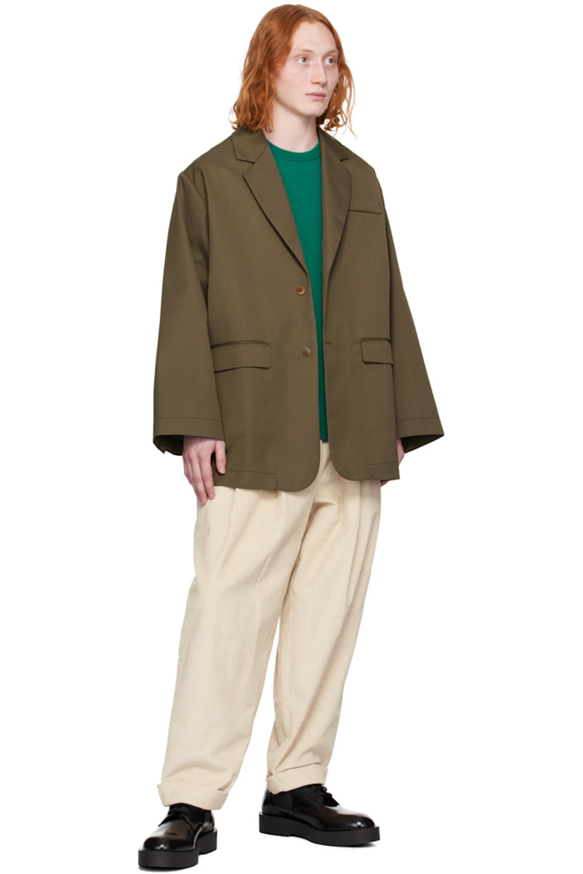 Water-repellent recycled polyester- and cotton-blend gabardine blazer.

· Notched lapel
· Two-button closure
· Welt pocket and flap pockets
· Dropped shoulders
· Three-button surgeon's cuffs
· Central vent at back hem
· Unlined

Supplier color: Khaki