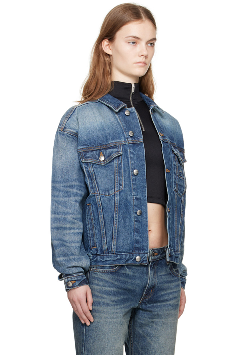 Non-stretch denim jacket. Fading throughout. 

· Paneled construction
· Spread collar 
· Button closure 
· Flap pockets and welt pockets
· Cinch tabs and leather logo patch at back hem 
· Logo-engraved silver-tone hardware
· Contrast stitching in tan

Available exclusively at SSENSE.

Supplier color: Light indigo