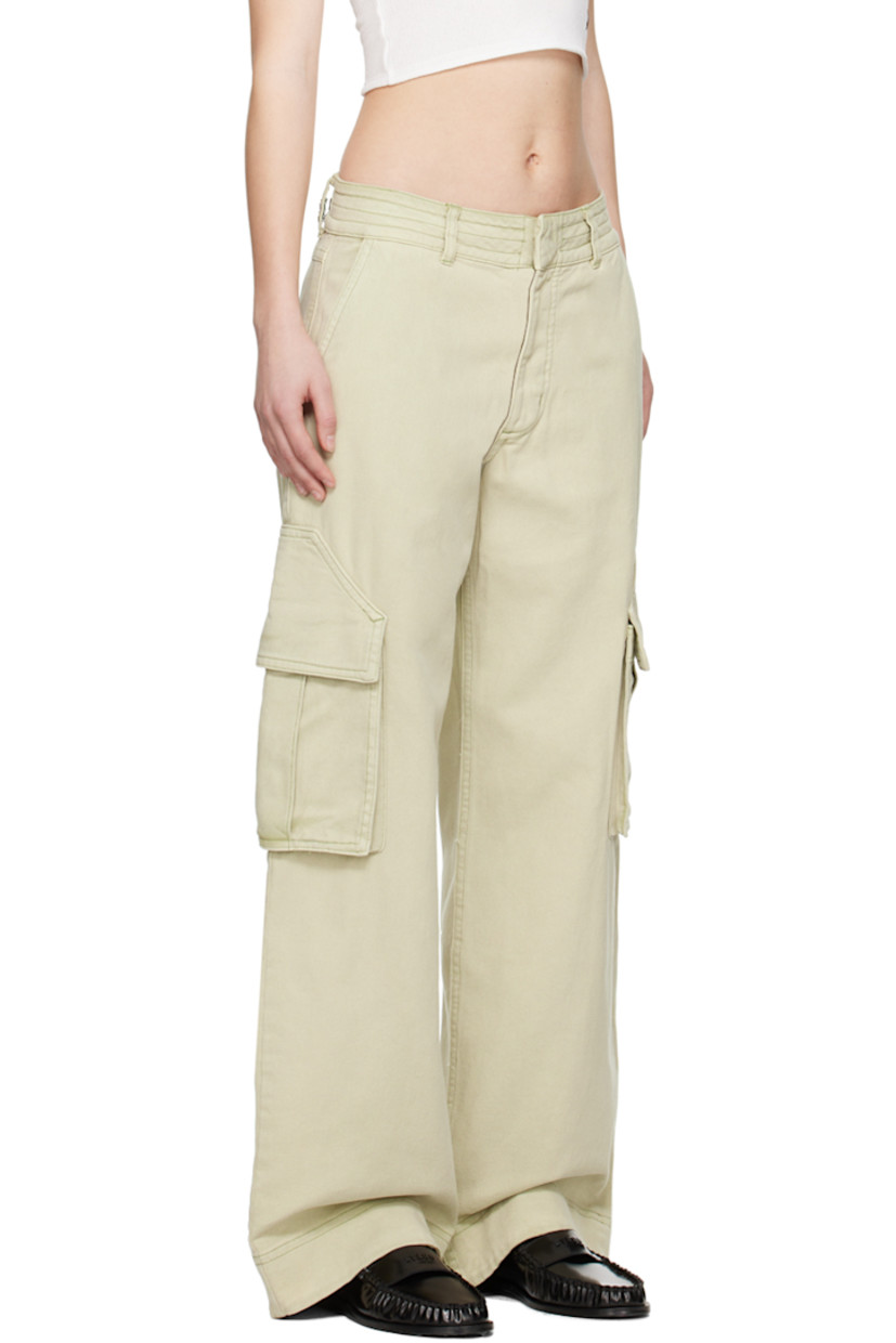 Cotton twill cargo pants. Fading throughout. 

· Belt loops
· Four-pocket styling 
· Zip-fly 
· Bellows pocket at outseams
· Contrast stitching in green

Supplier color: Beige