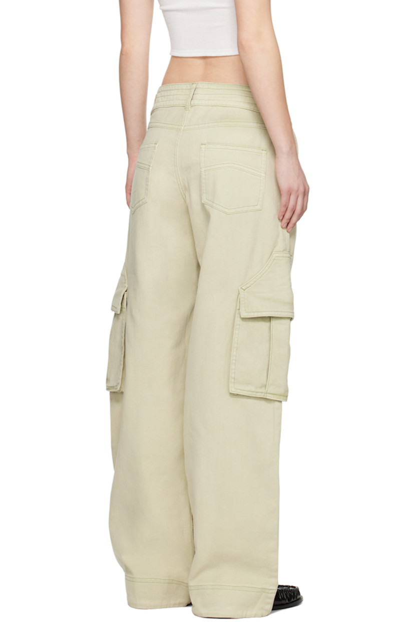 Cotton twill cargo pants. Fading throughout. 

· Belt loops
· Four-pocket styling 
· Zip-fly 
· Bellows pocket at outseams
· Contrast stitching in green

Supplier color: Beige