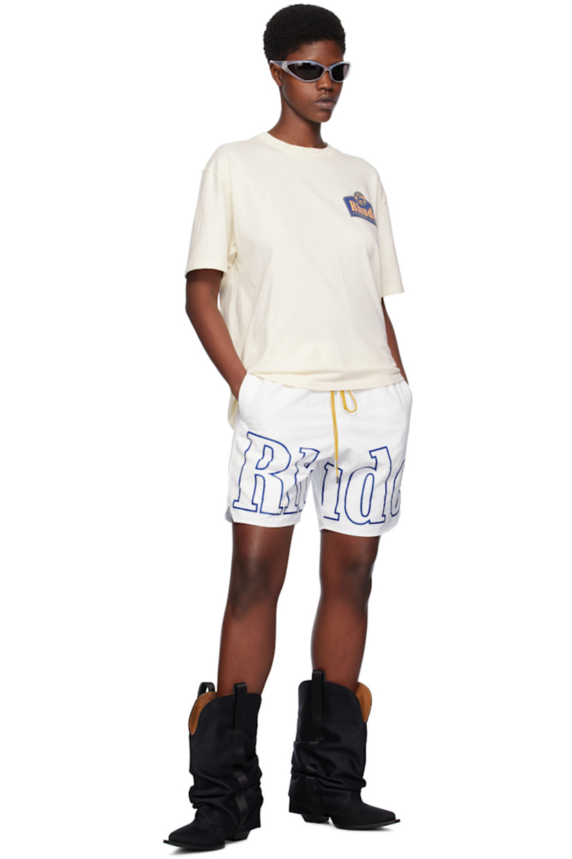 Nylon taffeta shorts. 

· Drawstring at elasticized waistband 
· Three-pocket styling 
· Logo printed at front 
· Vented cuffs 
· Full canvas lining 
· Logo-engraved silver-tone hardware

Supplier color: White