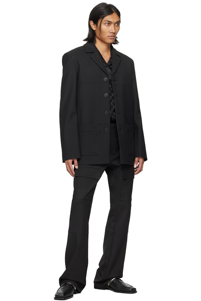Stretch polyester- and viscose-blend twill blazer.

· Notched lapel
· Button closure
· Patch pockets at front
· Full logo-woven satin lining

Supplier color: Black