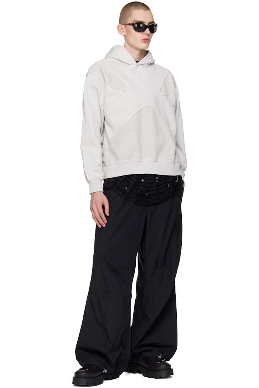 Heavyweight reverse French terry and French terry hoodie. Exposed seams and raw edges throughout.

· Paneled construction
· Logo embroidered at chest
· Rib knit hem and cuffs
· Dropped shoulders

Supplier color: Stone