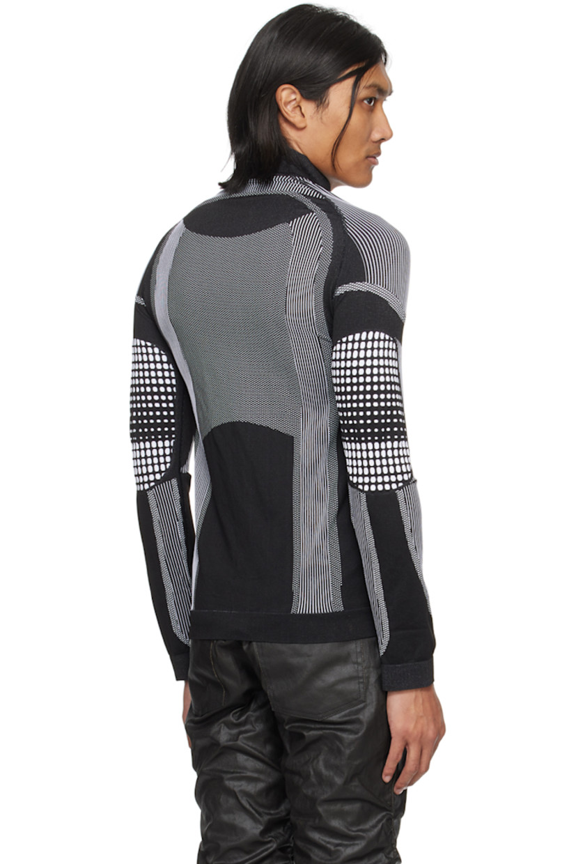 Stretch recycled nylon- and polyester-blend jersey turtleneck. Jacquard striped pattern throughout.

· Rib knit collar, hem, and cuffs
· Jacquard logo at chest and shoulders
· Raglan sleeves

Part of the Permanent collection. 

Supplier color: Black/White