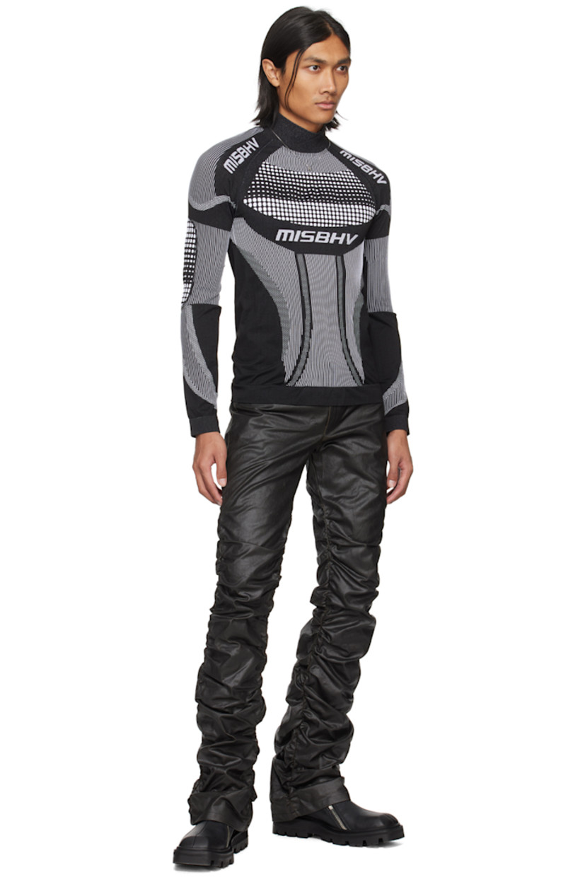 Stretch recycled nylon- and polyester-blend jersey turtleneck. Jacquard striped pattern throughout.

· Rib knit collar, hem, and cuffs
· Jacquard logo at chest and shoulders
· Raglan sleeves

Part of the Permanent collection. 

Supplier color: Black/White
