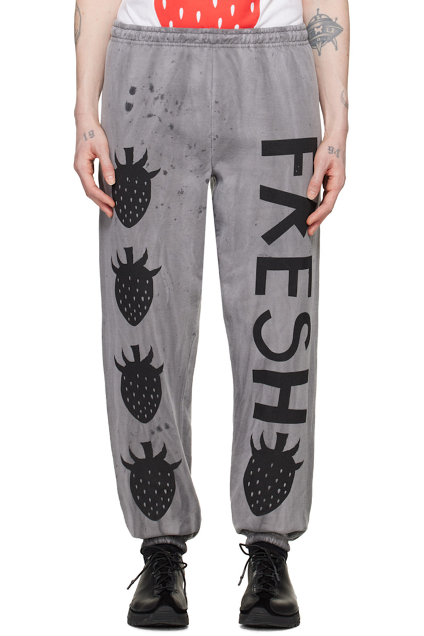 Handcrafted cotton- and polyester-blend fleece lounge pants. 

· Fading, paint splatter effect, and graphics printed throughout
· Elasticized waistband and cuffs

Each item is unique. Please note that finishings may vary.

Supplier color: Dirty charcoal