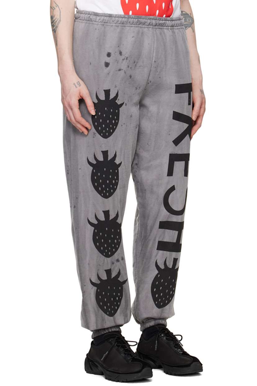 Handcrafted cotton- and polyester-blend fleece lounge pants. 

· Fading, paint splatter effect, and graphics printed throughout
· Elasticized waistband and cuffs

Each item is unique. Please note that finishings may vary.

Supplier color: Dirty charcoal