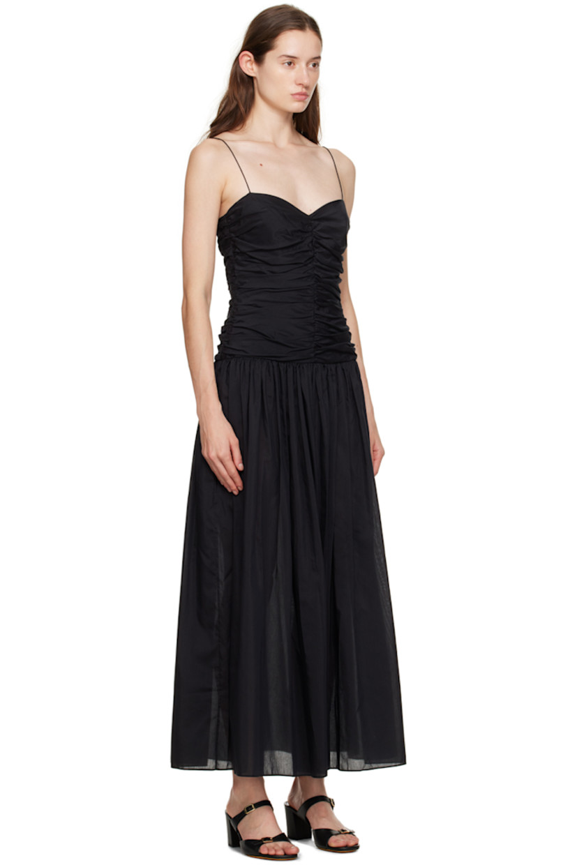 Organic cotton- and silk-blend poplin dress. Gathering throughout.

· Sweetheart neck
· Seam pockets
· Zip closure at side seam
· Fixed spaghetti straps
· Partial poplin lining

Supplier color: Black