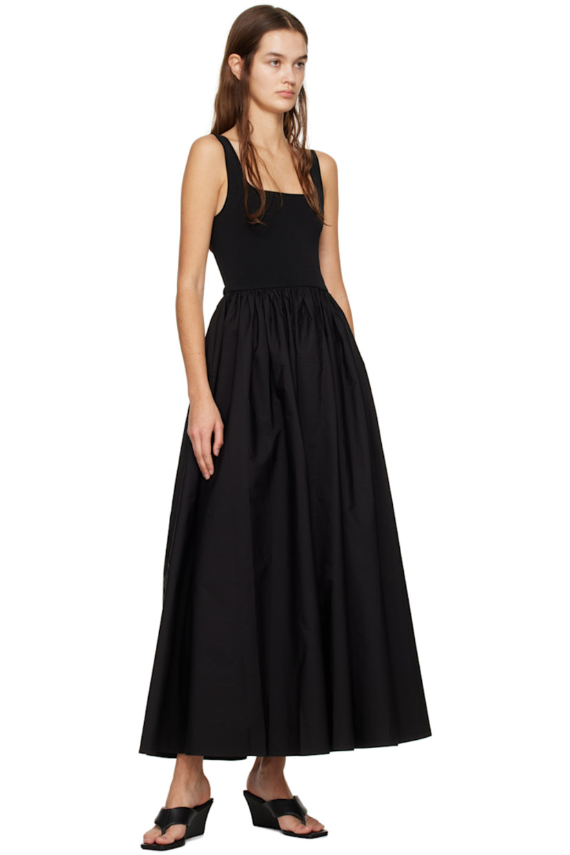 Knit stretch FSC-certified viscose-blend and BCI-certified organic cotton poplin dress.

· Paneled construction
· Square neck
· Gathering at waist
· Fixed shoulder straps
· Unlined

Supplier color: Black