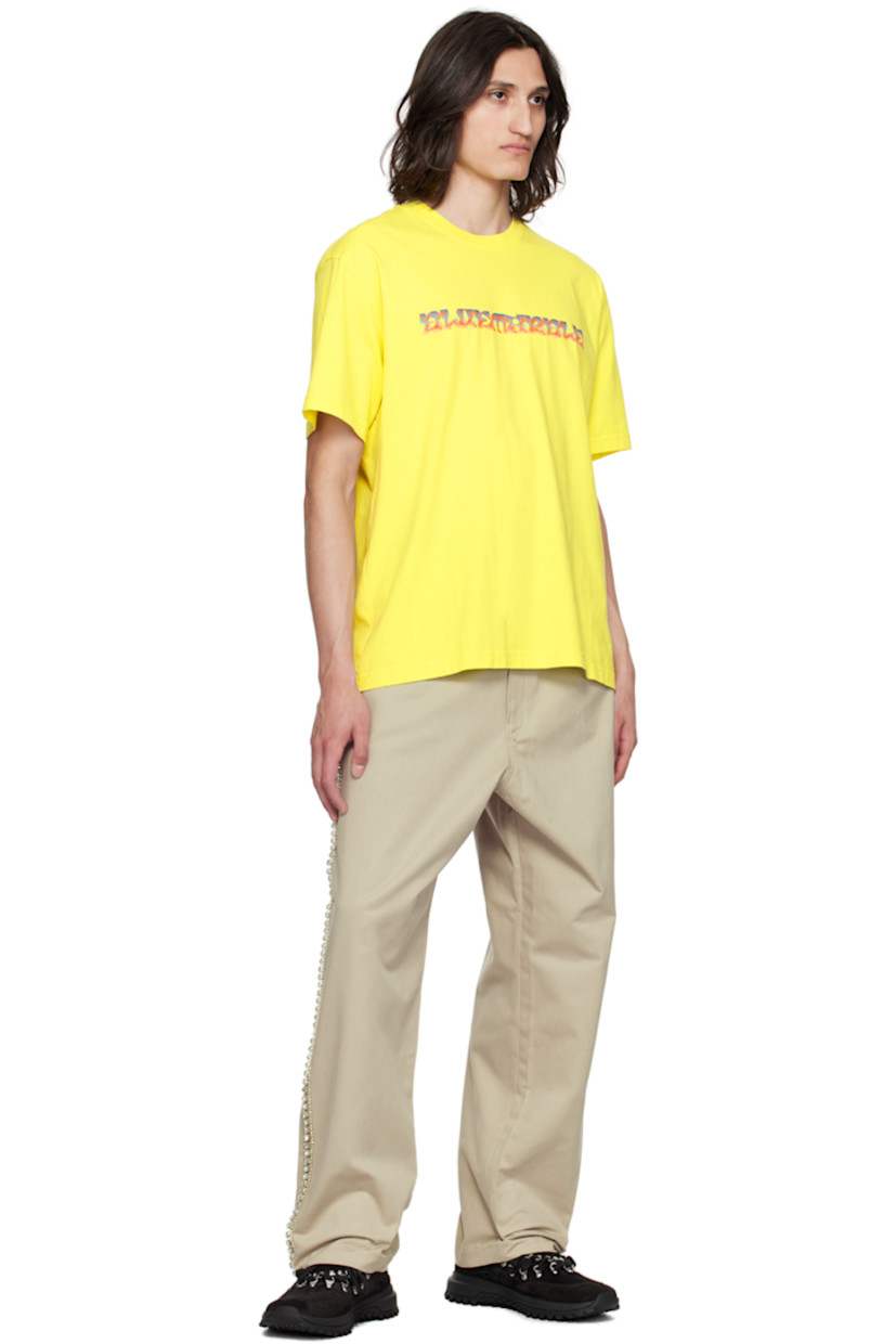 Cotton jersey T-shirt. 

· Rib knit crewneck
· Logo graphic printed at front
· Floral graphic printed at back

Supplier color: Yellow
