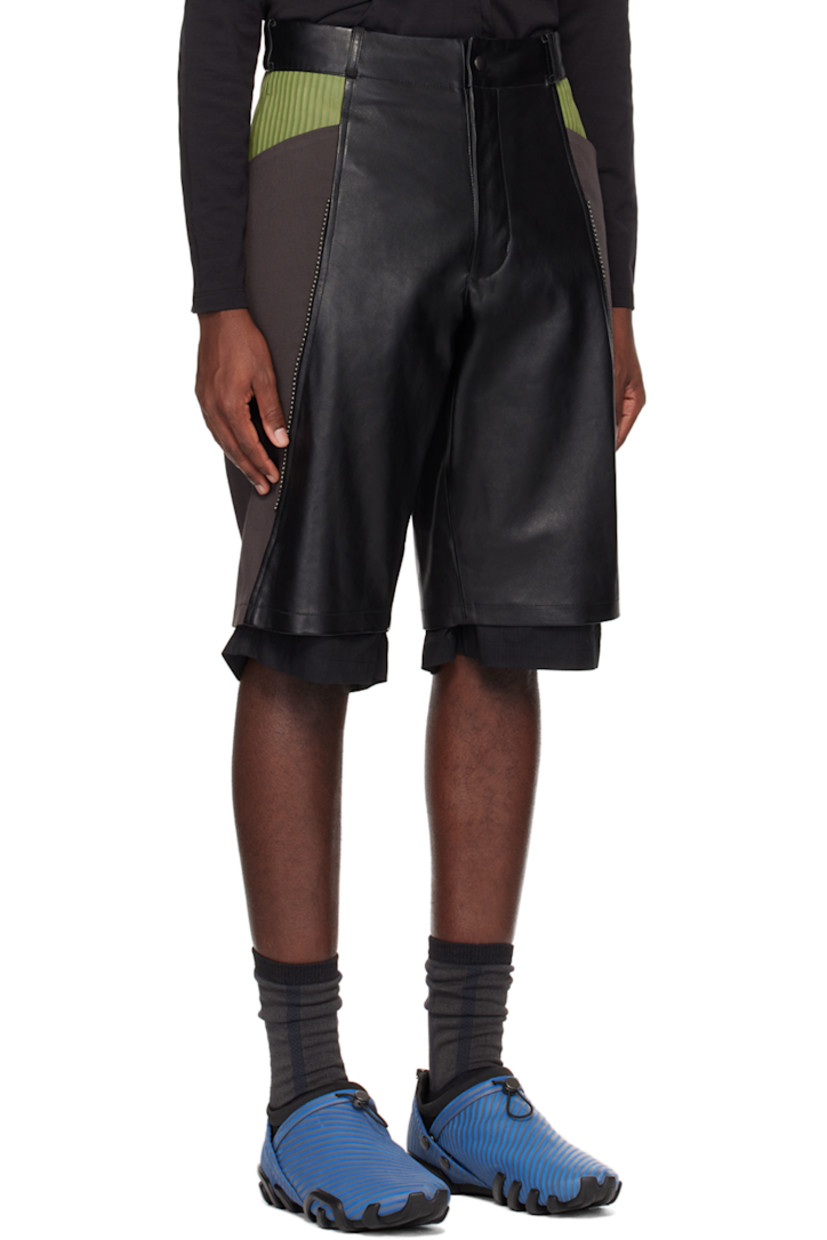 Buffed leather and cotton twill shorts. 

· Paneled construction
· Belt loops
· Stripe-embossed nubuck trim at waist
· Four-pocket styling
· Zip-fly
· Studs at front
· Inset seersucker cuffs 
· Full cotton seersucker lining

Part of the ECCO.kollektive x Kiko Kostadinov collaboration.

Supplier color: Black/Turtle green