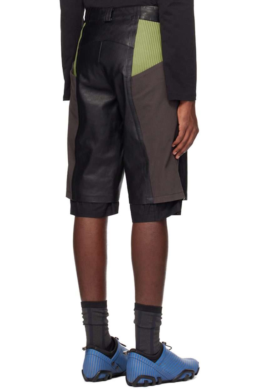 Buffed leather and cotton twill shorts. 

· Paneled construction
· Belt loops
· Stripe-embossed nubuck trim at waist
· Four-pocket styling
· Zip-fly
· Studs at front
· Inset seersucker cuffs 
· Full cotton seersucker lining

Part of the ECCO.kollektive x Kiko Kostadinov collaboration.

Supplier color: Black/Turtle green
