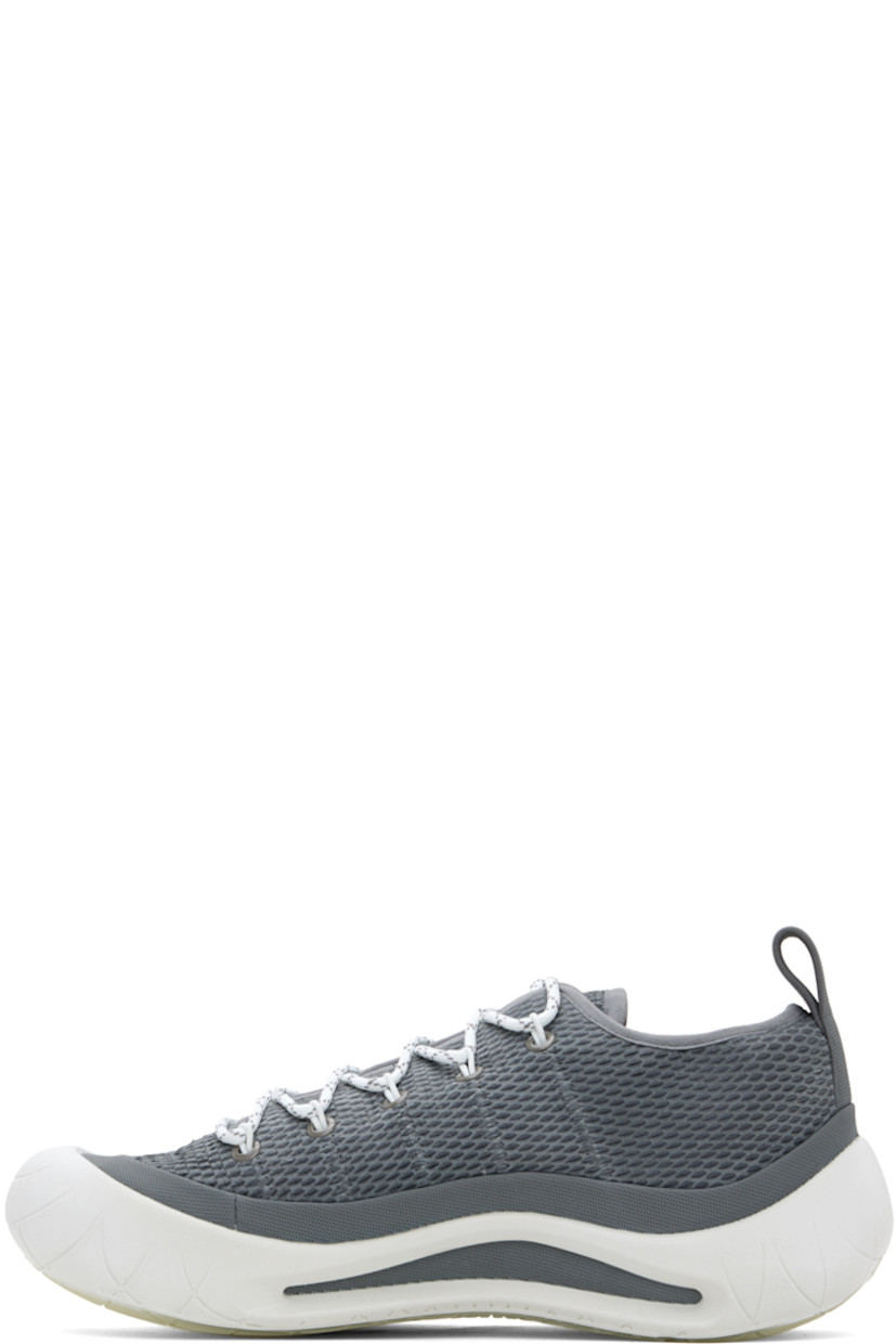 Low-top suede sneakers in gray.

· Rubberized trim and perforated detailing throughout
· Lace-up closure
· Pull-loop at heel tab
· Suede lining
· Sculptural rubber midsole
· Treaded rubber sole

Part of the ECCO.kollektive x Nina Christen collaboration.

Supplier color: Steel gray/Bright white