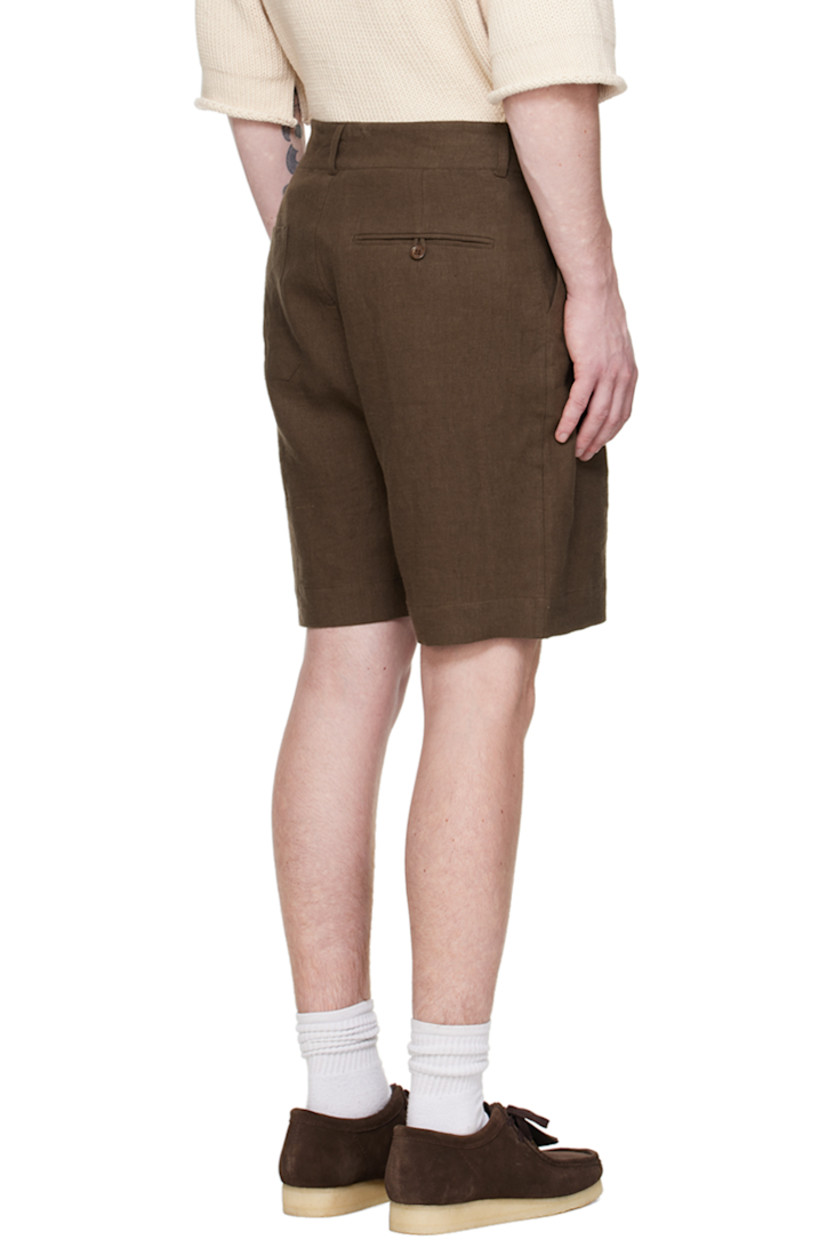 Linen muslin shorts.

· Belt loops
· Four-pocket styling
· Button-fly
· Pleats at front
· Recycled paper hardware

Supplier color: Brown