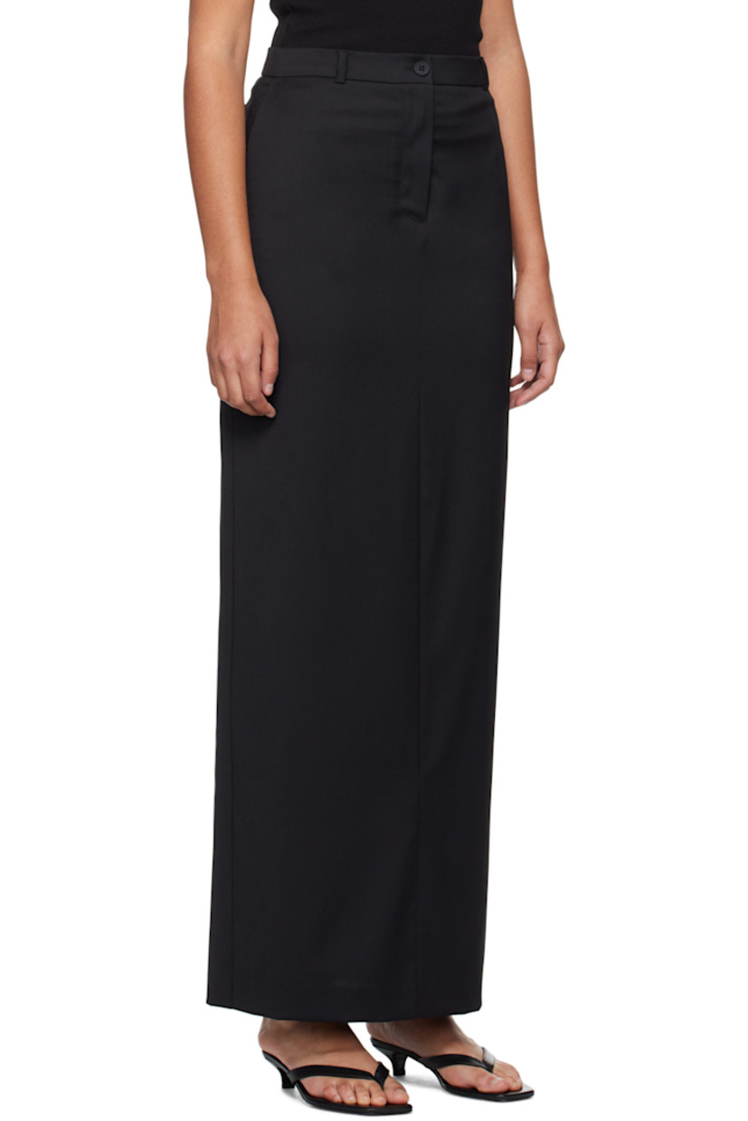 Stretch polyester- and wool-blend twill skirt.

· Belt loops
· Three-pocket styling
· Zip-fly
· Central vent at back hem
· Partial twill lining 

Supplier color: Black