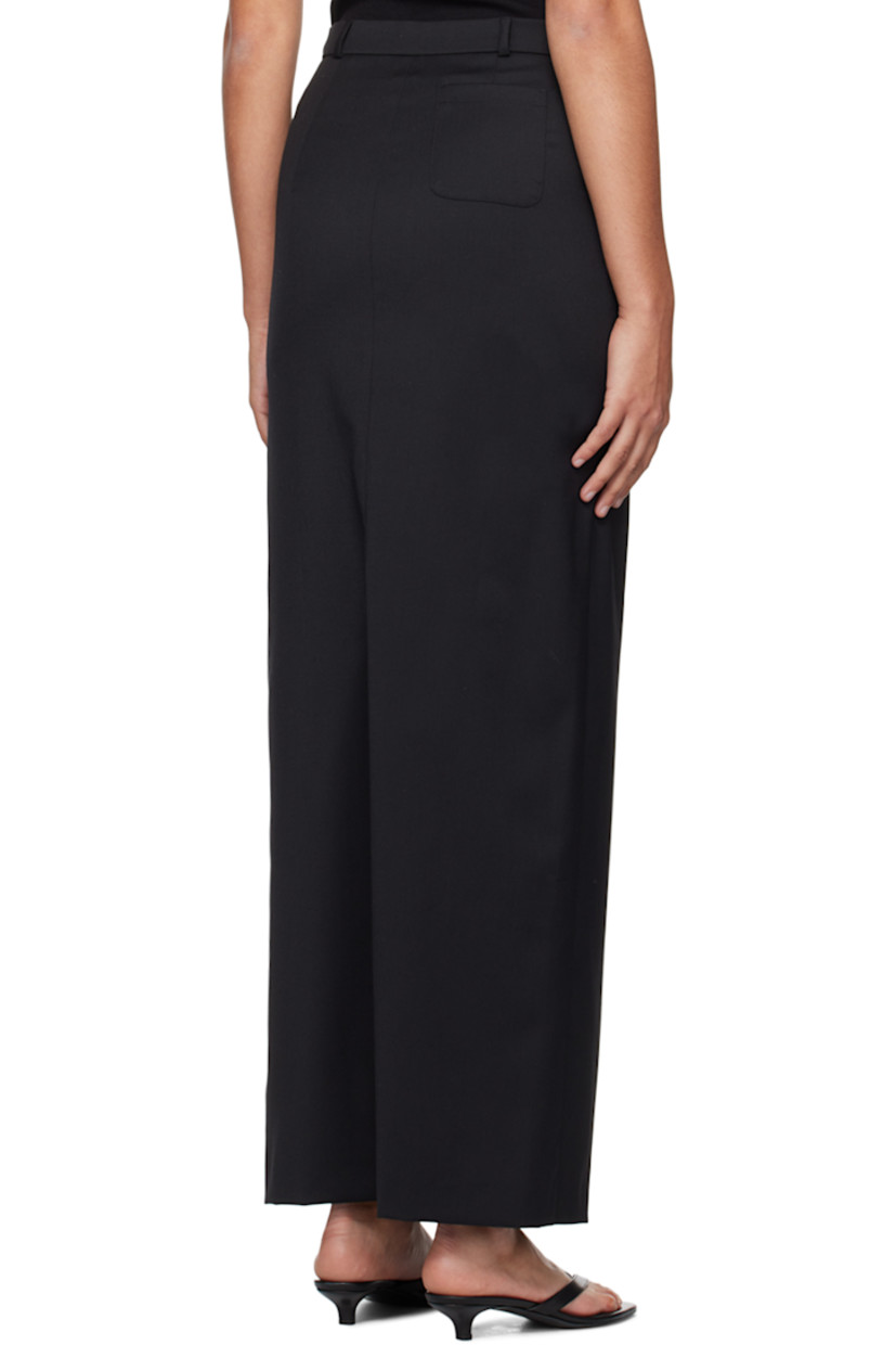 Stretch polyester- and wool-blend twill skirt.

· Belt loops
· Three-pocket styling
· Zip-fly
· Central vent at back hem
· Partial twill lining 

Supplier color: Black