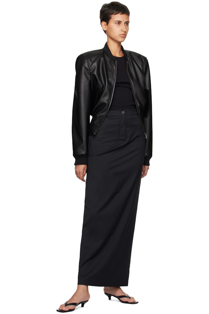 Stretch polyester- and wool-blend twill skirt.

· Belt loops
· Three-pocket styling
· Zip-fly
· Central vent at back hem
· Partial twill lining 

Supplier color: Black