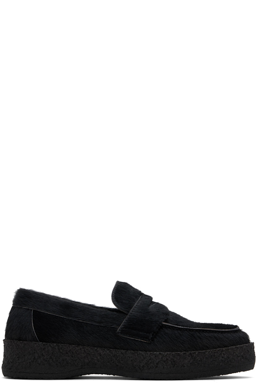 Calf-hair loafers in black.

· Strap with cutout at vamp
· Buffed leather and suede lining
· Logo stamp at padded leather footbed
· Crepe rubber platform midsole
· Treaded rubber sole

Supplier color: Black
