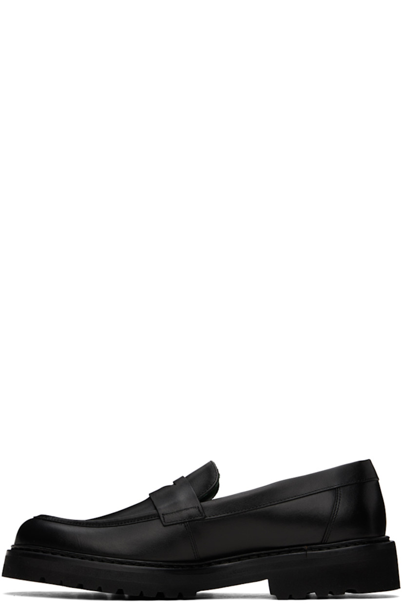 Buffed nappa leather loafers in black.

· Moc toe
· Strap with cutout at vamp
· Logo stamp at padded footbed
· Logo embossed at foam rubber midsole
· Treaded Vibram®Vi-Lite rubber outsole
· Heel: H1.5"

Supplier color: Black