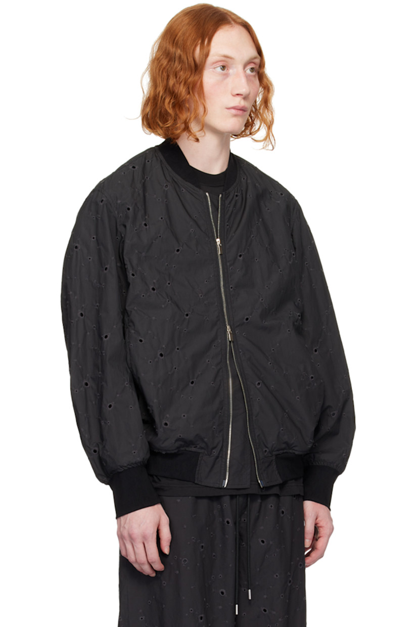 Cotton broderie anglaise bomber jacket.

· Rib knit stand collar, hem, and cuffs
· Zip closure
· Welt pockets
· Dropped shoulders

Supplier color: Black