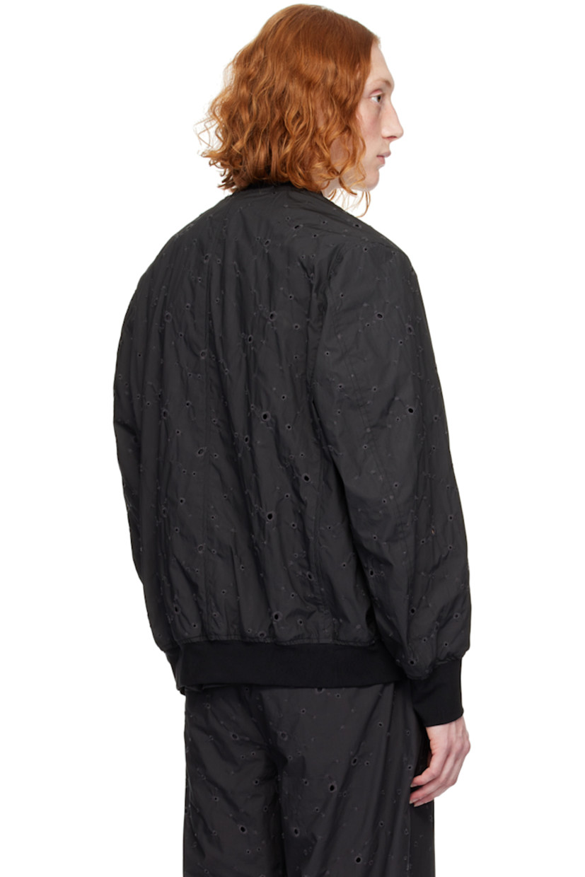 Cotton broderie anglaise bomber jacket.

· Rib knit stand collar, hem, and cuffs
· Zip closure
· Welt pockets
· Dropped shoulders

Supplier color: Black
