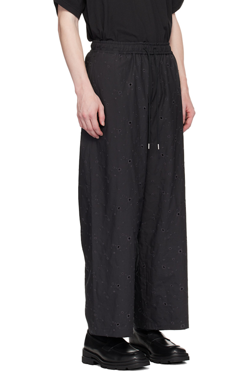 Wide-leg cotton broderie anglaise trousers.

· Drawstring at elasticized waistband
· Four-pocket styling
· Full satin twill lining

Supplier color: Black