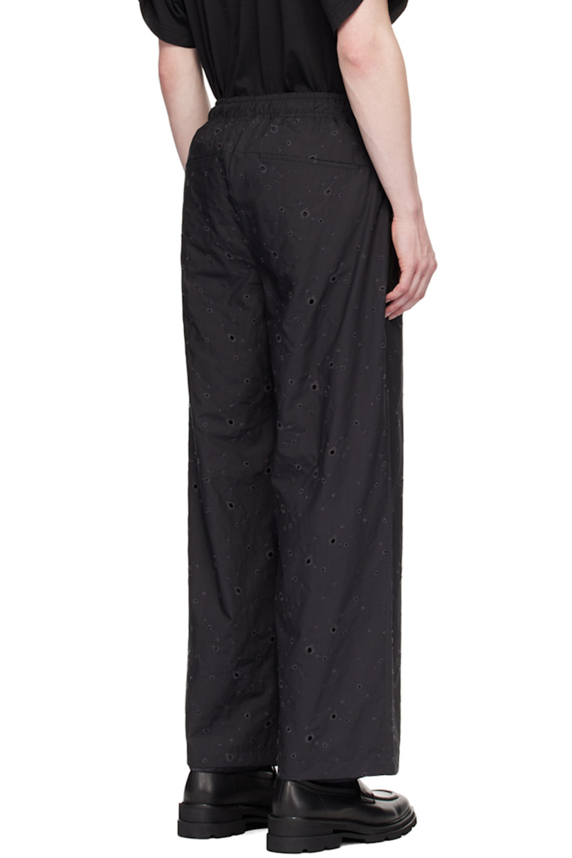 Wide-leg cotton broderie anglaise trousers.

· Drawstring at elasticized waistband
· Four-pocket styling
· Full satin twill lining

Supplier color: Black