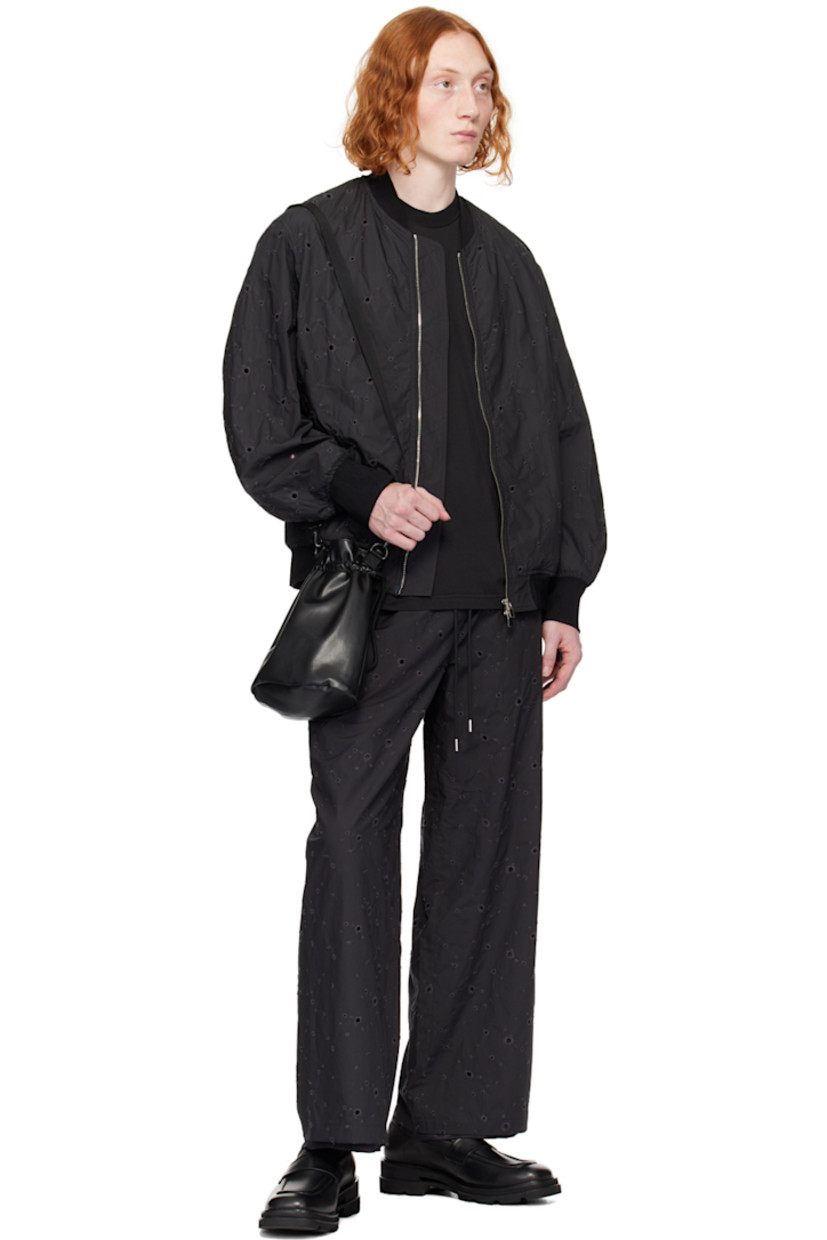Wide-leg cotton broderie anglaise trousers.

· Drawstring at elasticized waistband
· Four-pocket styling
· Full satin twill lining

Supplier color: Black