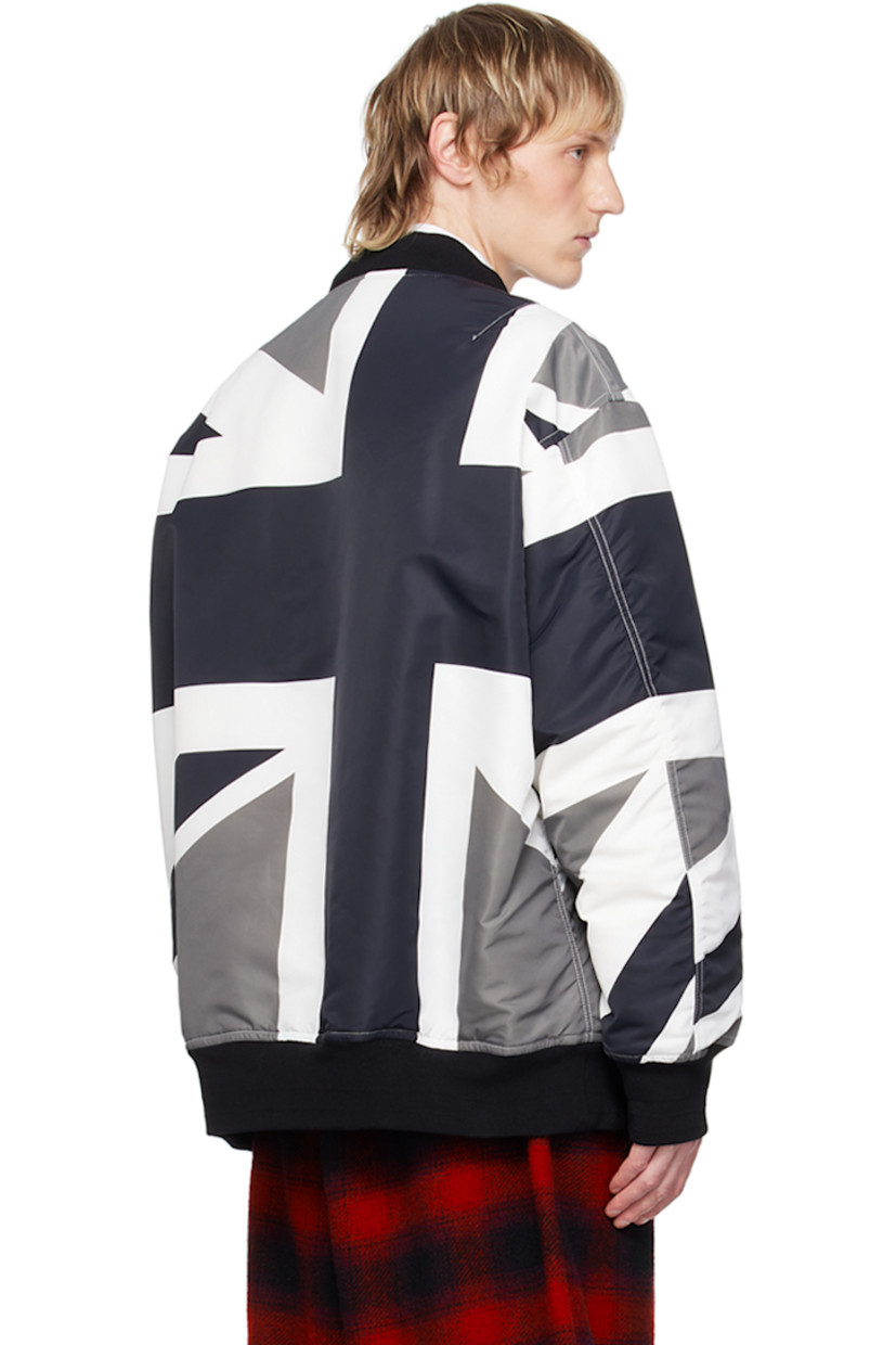 Padded nylon twill bomber jacket. Graphic printed throughout.

· Rib knit stand collar, hem, and cuffs
· Two-way zip closure
· Press-stud tab at front
· Welt pockets
· Utility pocket at sleeve
· Gusset at back sleeves
· Welt pockets at interior
· Full twill lining

Supplier color: Monotone