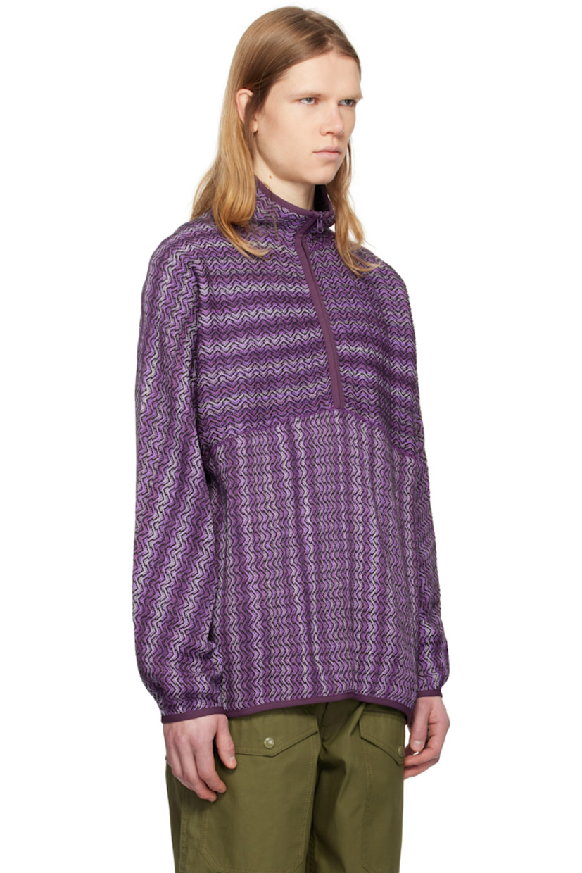 Knit acrylic- and cotton-blend sweater. Kasuri-dyed pattern throughout.

· Elasticized trim at stand collar, hem, and cuffs
· Half-zip closure
· Seam pockets
· Raglan sleeves

Supplier color: Purple
