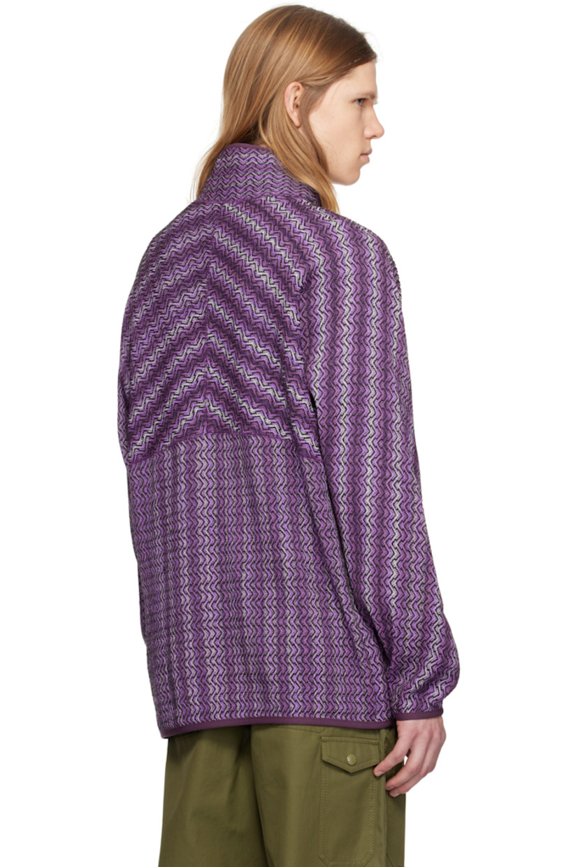 Knit acrylic- and cotton-blend sweater. Kasuri-dyed pattern throughout.

· Elasticized trim at stand collar, hem, and cuffs
· Half-zip closure
· Seam pockets
· Raglan sleeves

Supplier color: Purple