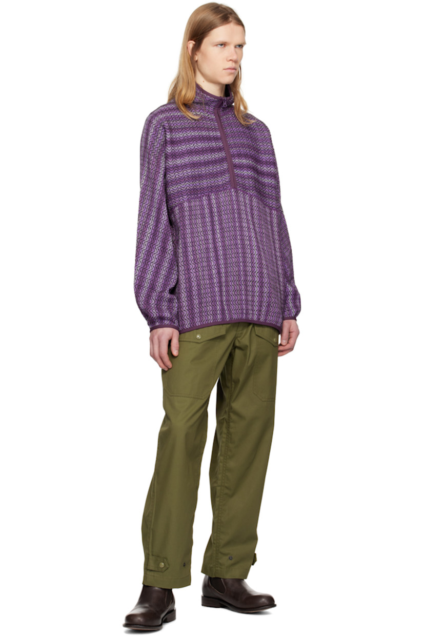 Knit acrylic- and cotton-blend sweater. Kasuri-dyed pattern throughout.

· Elasticized trim at stand collar, hem, and cuffs
· Half-zip closure
· Seam pockets
· Raglan sleeves

Supplier color: Purple
