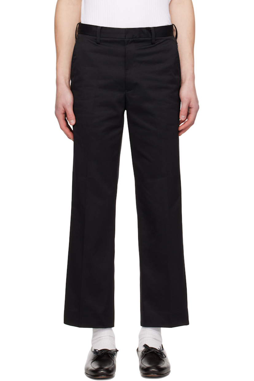 Cotton- and polyester-blend twill trousers.

· Belt loops
· Six-pocket styling
· Zip-fly
· Central crease at front and back legs
· Darts at back waist

Supplier color: Navy