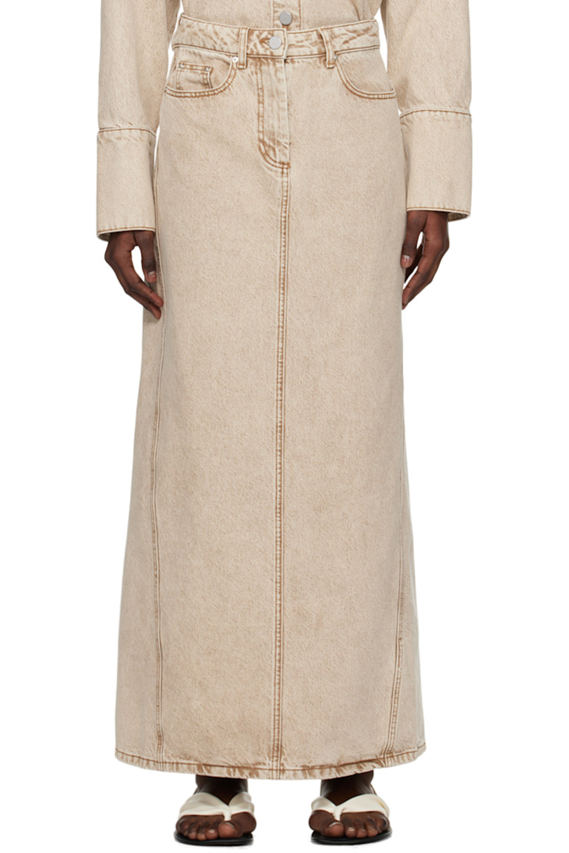 Non-stretch organic cotton denim skirt. Fading throughout.

· Belt loops
· Five-pocket styling
· Zip-fly
· Central vent at back hem

Supplier color: Pure cashmere