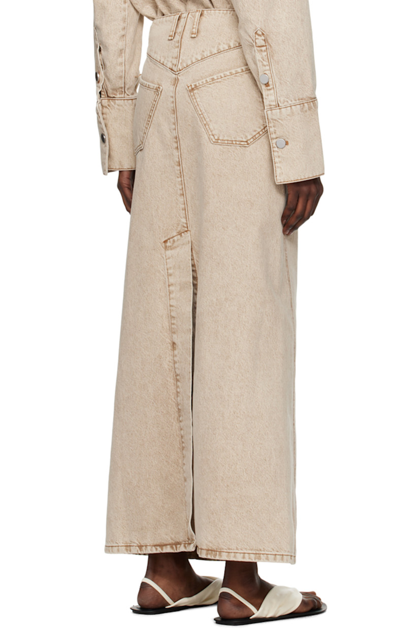 Non-stretch organic cotton denim skirt. Fading throughout.

· Belt loops
· Five-pocket styling
· Zip-fly
· Central vent at back hem

Supplier color: Pure cashmere