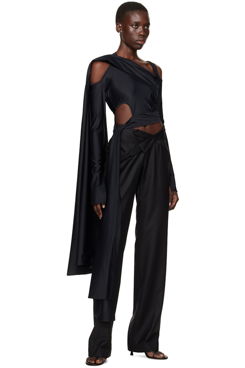Relaxed-fit straight-leg wool twill trousers.

· Belt loops at asymmetric waistband
· Three-pocket styling
· Welt pocket at outseam
· Belt loops and belt-style trim at back 

Supplier color: Black