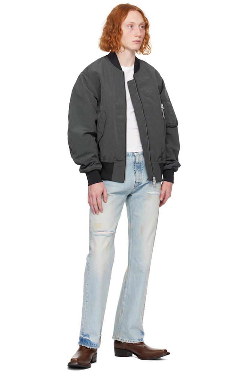 Relaxed-fit non-stretch organic cotton denim jeans. Embroidered detailing, smudging, distressing, and fading throughout.

· Belt loops
· Five-pocket styling 
· Button-fly
· Logo patch at back waist
· Contrast stitching in tan 

Supplier color: Dirty blue vintage