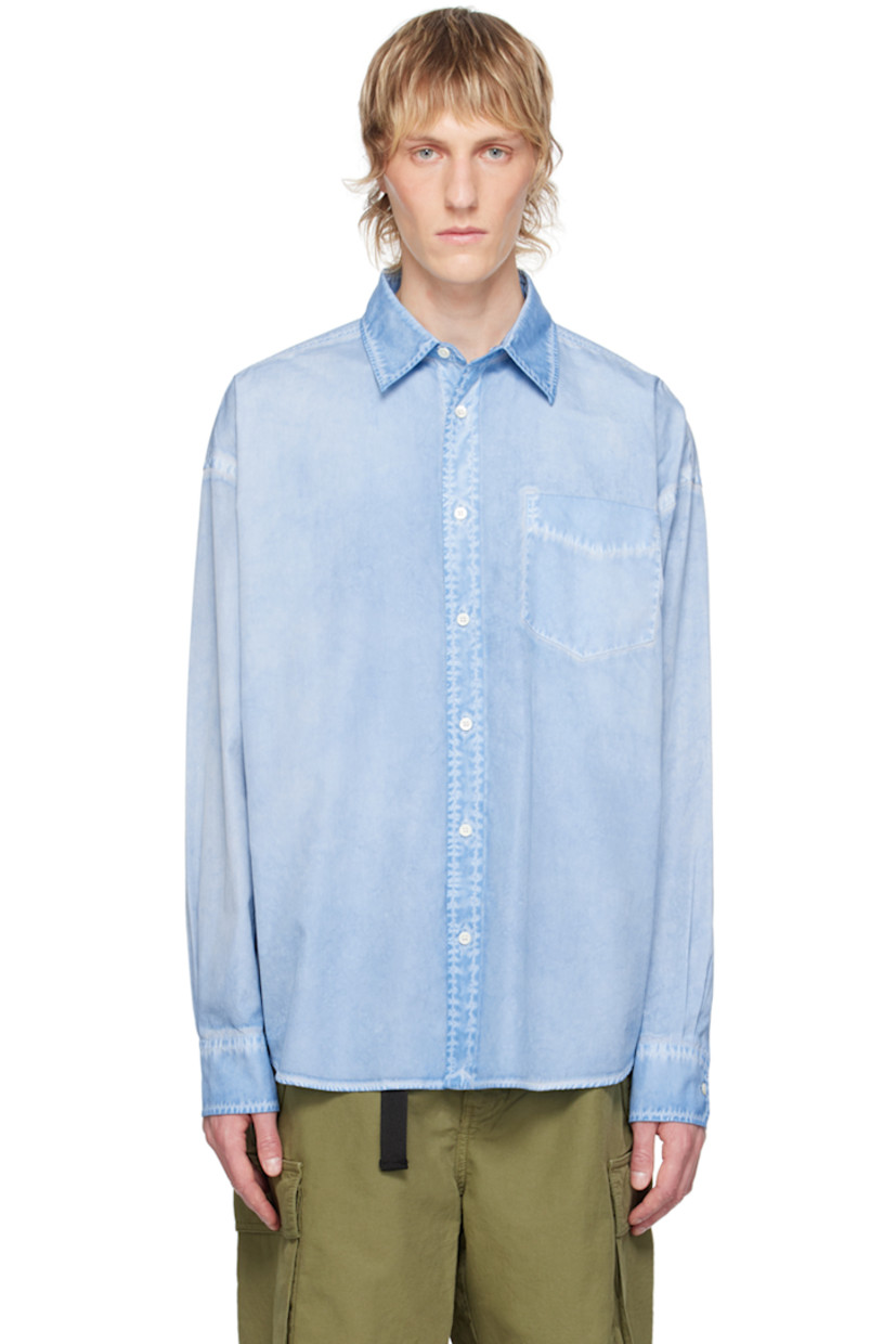 Garment-dyed cotton poplin shirt. Fading throughout.

· Spread collar
· Button closure
· Patch pocket 
· Shirttail hem
· Dropped shoulders
· Adjustable single-button barrel cuffs
· Box pleat at back yoke
· Mother-of-pearl hardware

Supplier color: Aqua blue
