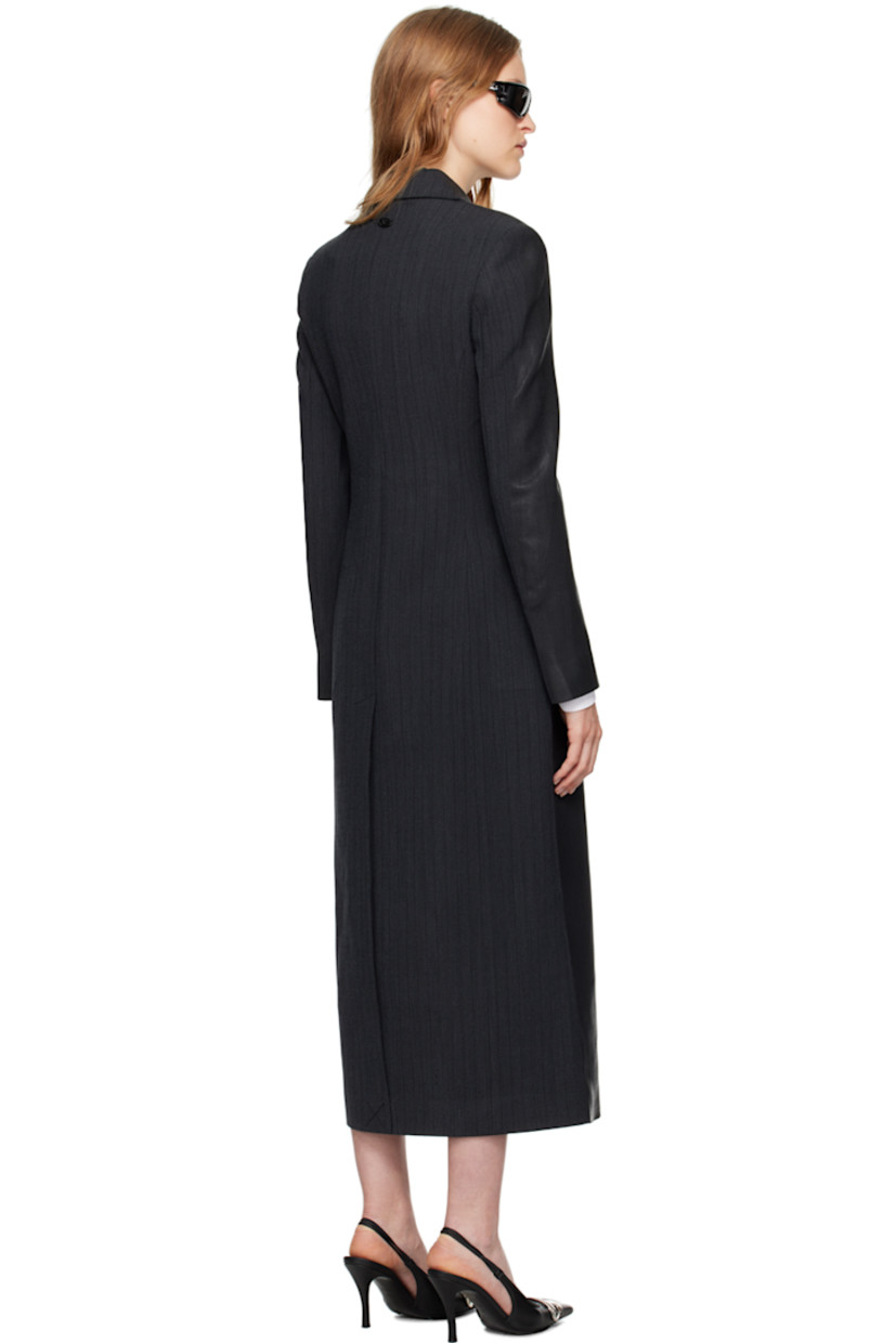 Coated stretch polyester- and virgin wool-blend twill coat. Jacquard pinstripes throughout.

· Notched lapel
· Button closure
· Welt pockets
· Padded shoulders
· Logo hardware at back collar
· Central vent at back hem
· Welt pocket at interior
· Full satin lining

Supplier color: Black