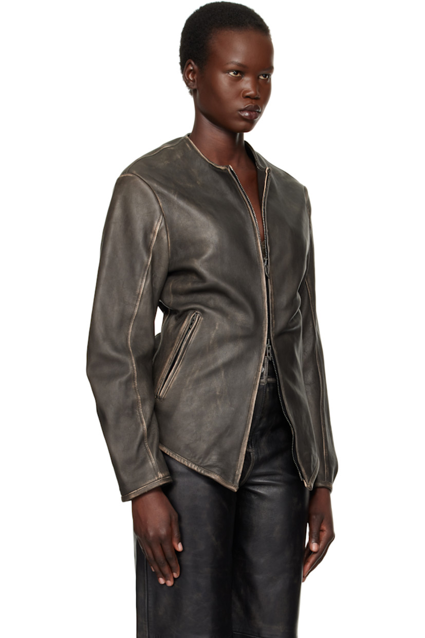 Grained lambskin jacket. Fading throughout.

· Round neck
· Two-way zip closure
· Zip pockets
· Curved hem
· Logo embossed at shoulder
· Welt pockets at interior
· Full logo-woven satin lining

Supplier color: Black