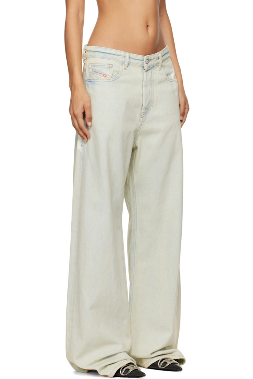 Relaxed-fit wide-leg non-stretch organic cotton denim jeans. Fading and bleach effect throughout.

· Low-rise 
· Belt loops
· Five-pocket styling
· Button-fly
· Logo patch at coin pocket
· Logo patch at back waistband
· Raw edge at back cuffs
· Contrast stitching in tan

Supplier color: Light blue
