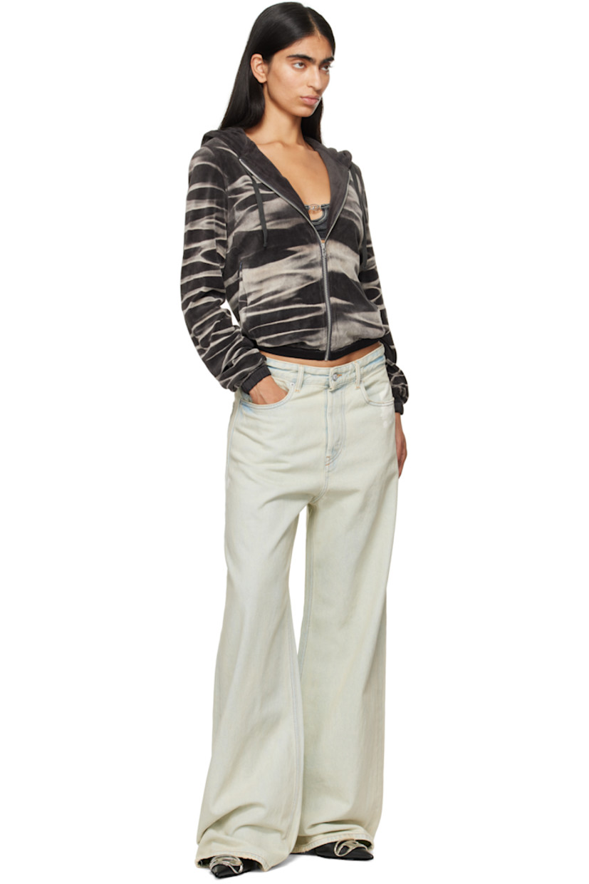 Relaxed-fit wide-leg non-stretch organic cotton denim jeans. Fading and bleach effect throughout.

· Low-rise 
· Belt loops
· Five-pocket styling
· Button-fly
· Logo patch at coin pocket
· Logo patch at back waistband
· Raw edge at back cuffs
· Contrast stitching in tan

Supplier color: Light blue