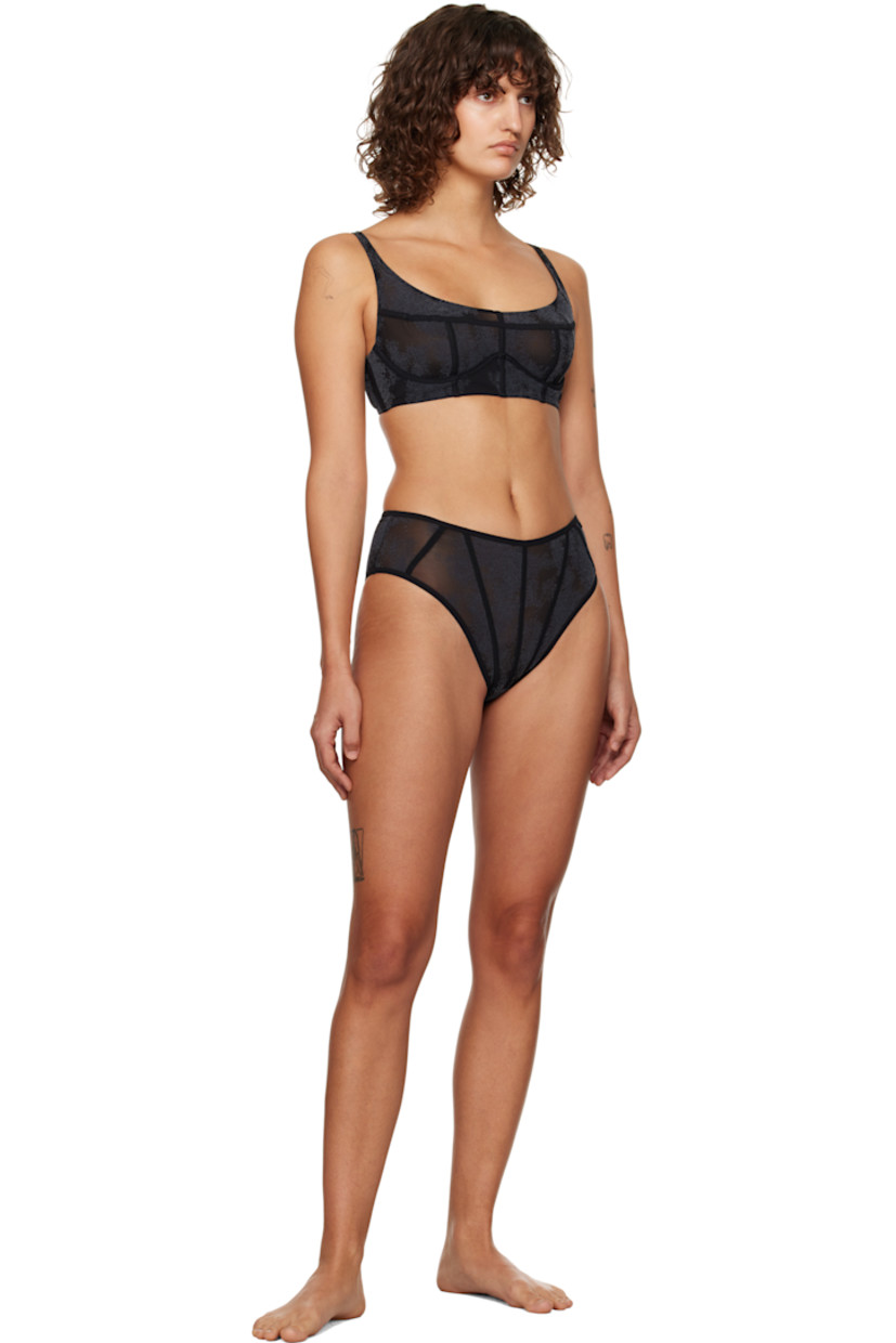 Sheer stretch nylon mesh briefs. Graphic pattern flocked throughout.

· High-rise
· Logo hardware at elasticized waistband
· Partial cotton jersey lining

Part of the Diesel + Savage X Fenty collaboration.

Supplier color: Black