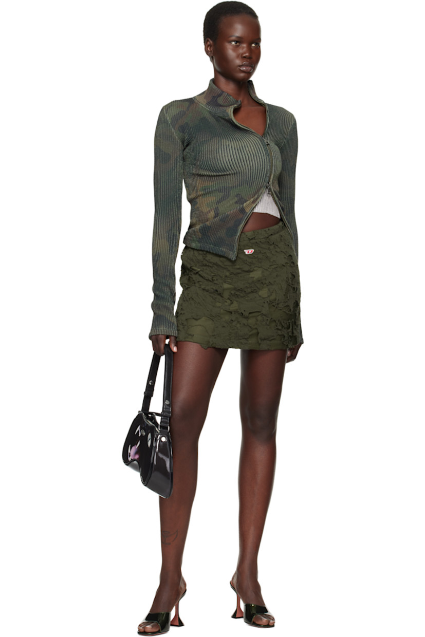 Cotton jersey miniskirt. Distressing throughout.

· Concealed drawstring at elasticized waistband
· Embroidered logo patch at front
· Exposed interlock jersey lining

Supplier color: Olive green