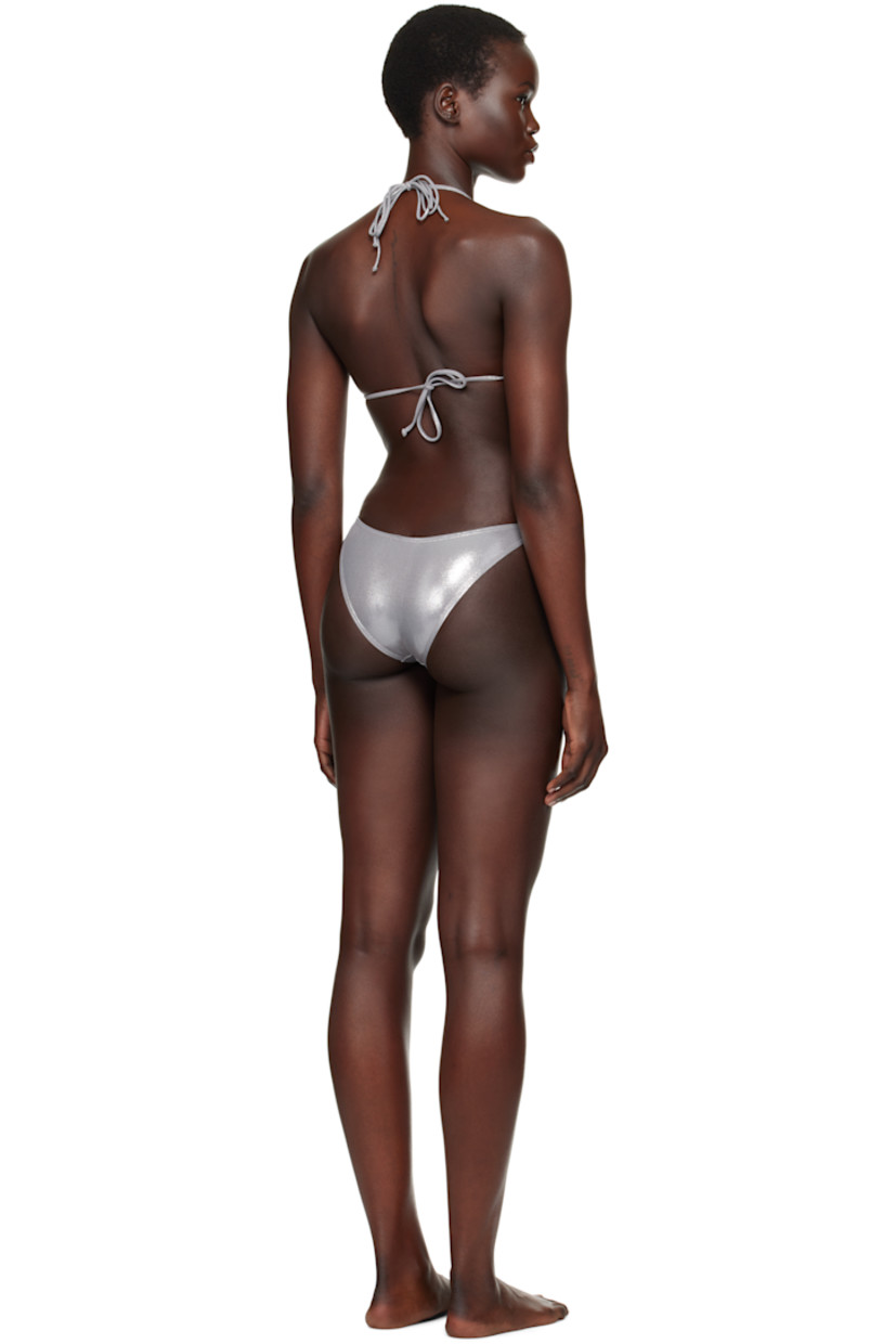 Stretch nylon lamé jersey bikini top.

· Removable padding at cups
· Logo hardware at chest
· Self-tie halter strap
· Self-tie fastening at back
· Full jersey lining

Stretch nylon lamé jersey bikini bottom.

· Logo hardware at elasticized waistband
· Partial jersey lining

Supplier color: Silver