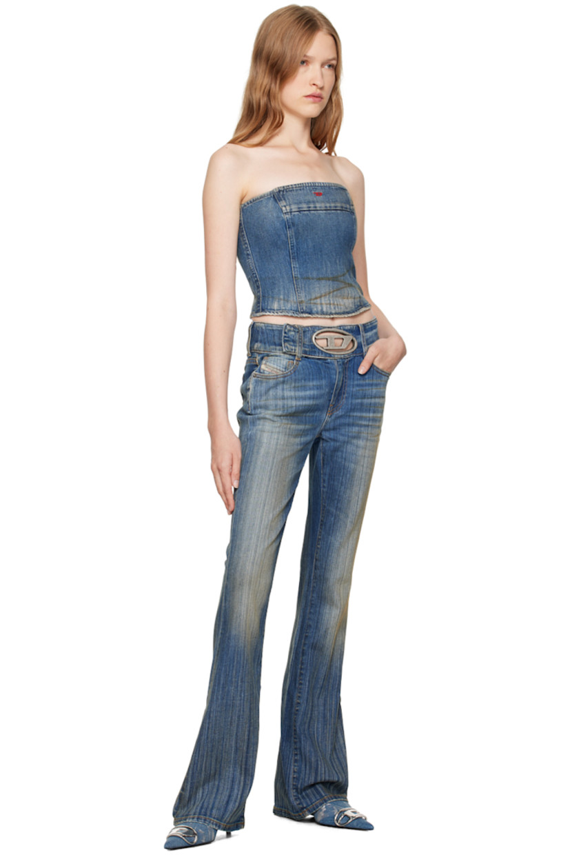Non-stretch denim tube top. Fading and whiskering throughout.

· Straight neck
· Zip closure at side-seam
· Embroidered logo at chest

Supplier color: Dark Blue