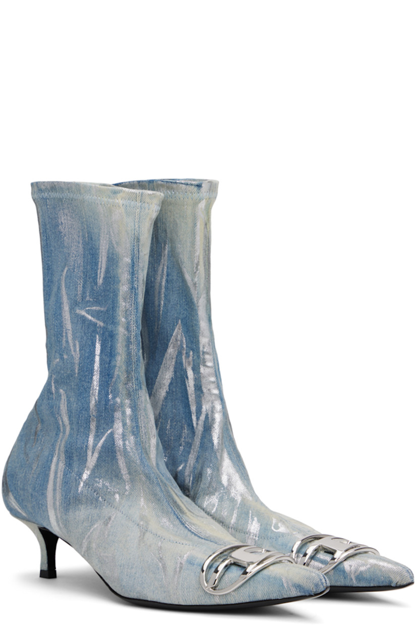 Mid-calf stretch denim boots in blue

· Fading and smudged dye throughout
· Logo hardware at pointed toe
· Elasticized collar
· Zip closure at heel
· Faux-leather lining
· Covered kitten heel with rubber injection
· Polished leather sole
· Heel: H1.75"

Each item is unique. Please note coloration may vary.

Supplier color: Blue