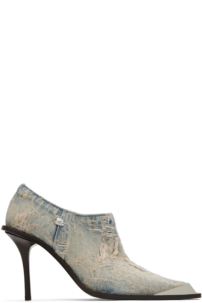 Ankle-high denim boots in blue.

· Fading and distressing throughout
· Pointed metal cap toe
· Logo hardware at outer side
· Zip closure at inner side
· Buffed leather lining
· Stiletto heel with rubber injection
· Leather sole
· Heel: H3.25"

Supplier color: Light blue