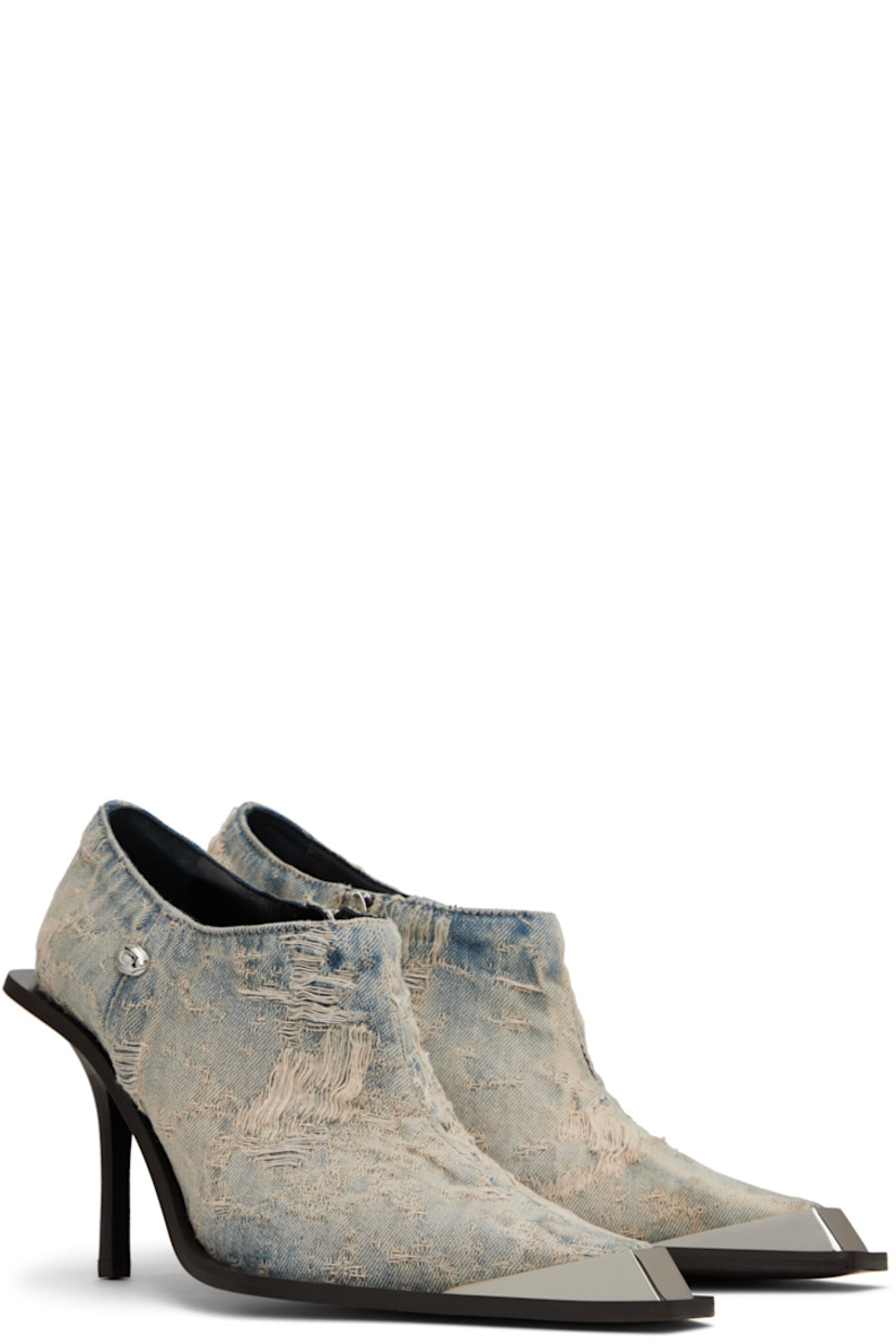 Ankle-high denim boots in blue.

· Fading and distressing throughout
· Pointed metal cap toe
· Logo hardware at outer side
· Zip closure at inner side
· Buffed leather lining
· Stiletto heel with rubber injection
· Leather sole
· Heel: H3.25"

Supplier color: Light blue